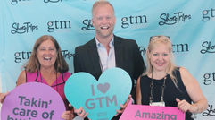 GTM attendees have fun at the ShoreTrips Step & Repeat.