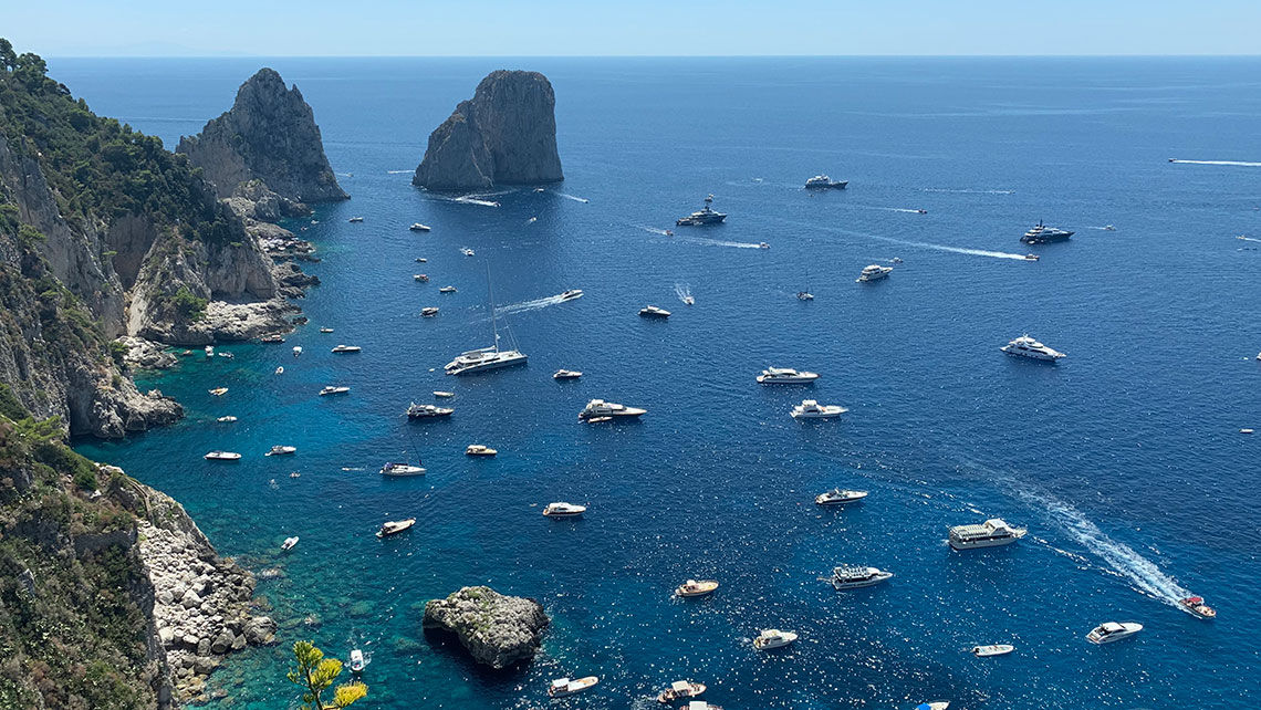 View of the Faraglioni rocks and the Gulf of Naples from Caesar Augustus gardens in Capri.