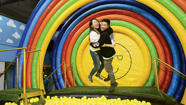 Taking the leap into the Pot of Happiness, one of the Instagram-worthy attractions at the interactive pop-up exhibit. Taking the leap into the Pot of Happiness, one of the Instagram-worthy attractions at the interactive pop-up exhibit.