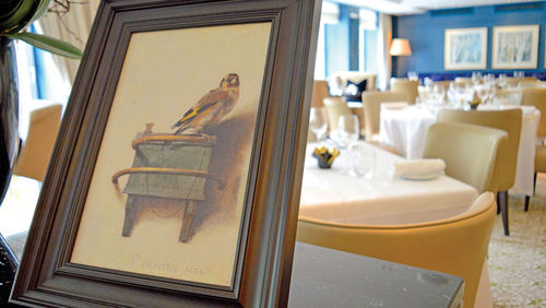 Goldfinch Brasserie at the Waldorf Astoria Amsterdam takes its inspiration from Carel Fabritius’ painting, a reproduction of which is displayed at the restaurant. Goldfinch Brasserie at the Waldorf Astoria Amsterdam takes its inspiration from Carel Fabritius’ painting, a reproduction of which is displayed at the restaurant.