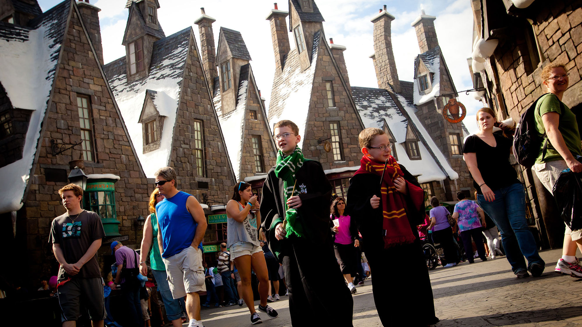 Little wizards traipse the streets of Hogsmeade, part of the Wizarding World of Harry Potter at Universal Orlando Resort.