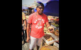 Delven Adams guides visitors through Georgetown's Bourda market and then brings them home to cook for them at the ''Backyard Cafe'' behind his house in a residential neighborhood.