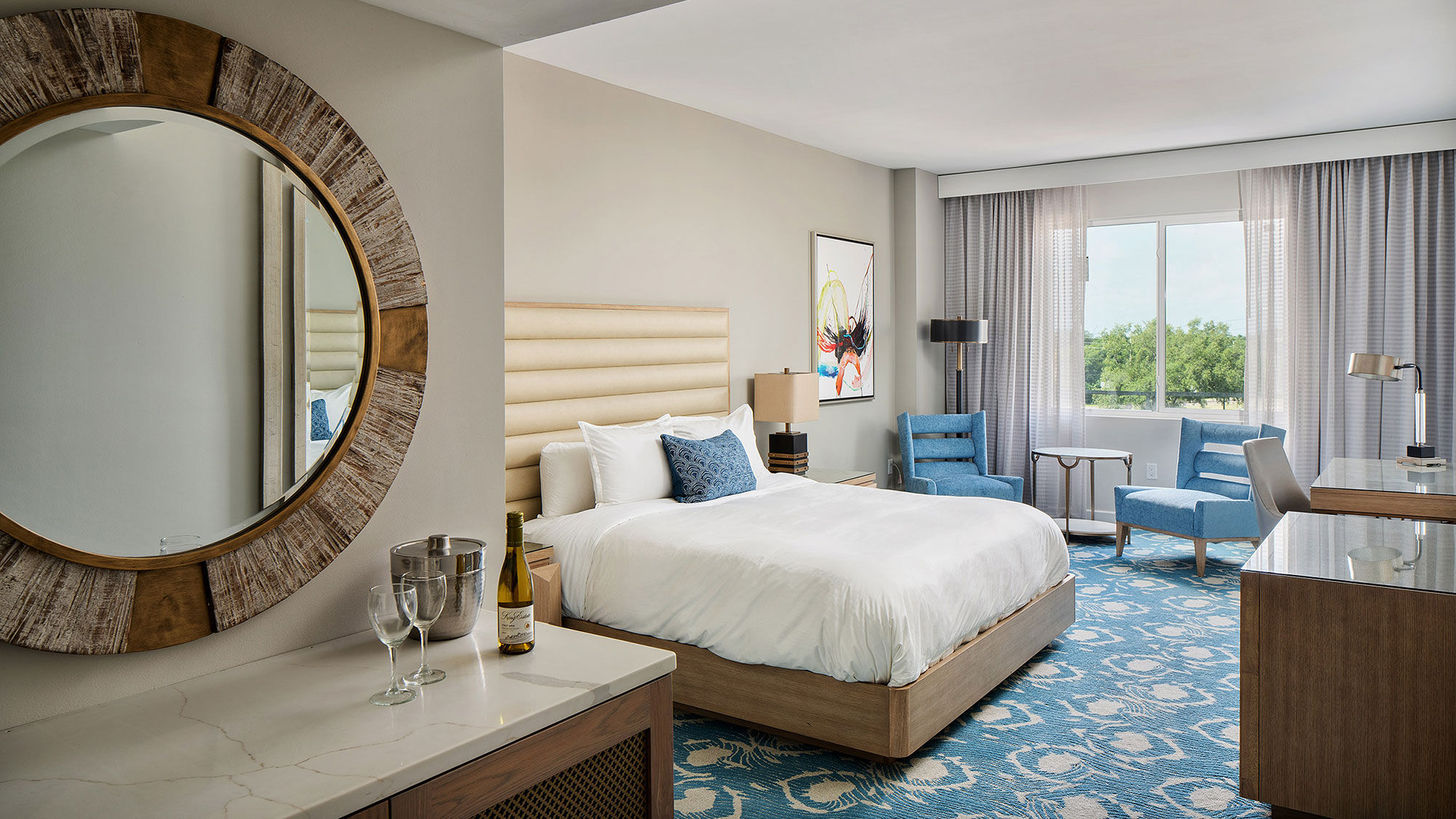 Guestrooms at the Karol Hotel will feature a neutral, elegant palette of white marble, tawny beige and grey with some bold accents of Florida sky blue carpet.