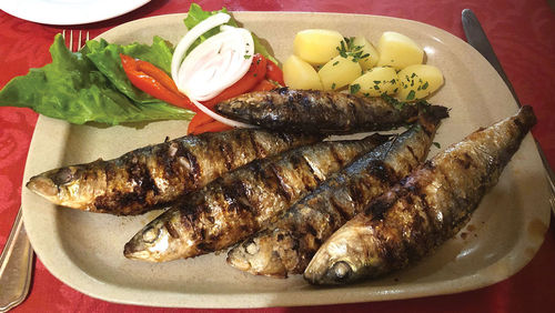 Grilled sardines are a classic lunch option in Portugal. Grilled sardines are a classic lunch option in Portugal.
