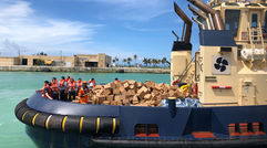 The cruise line launched an ambitious hurricane relief program to provide tens of thousands of meals daily to victims of Hurricane Dorian on Grand Bahama. The first ship, the Empress of the Seas, arrived Sept. 5 and anchored offshore of the still-closed harbor in Freeport. Workers aboard had spent all night cooking and packing 10,000 boxed lunches, which were ferried ashore by tenders and port tugs, along with bottled water and some canned provisions.