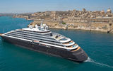 The Scenic Eclipse in Malta, with its black chopper on the stern's top deck.