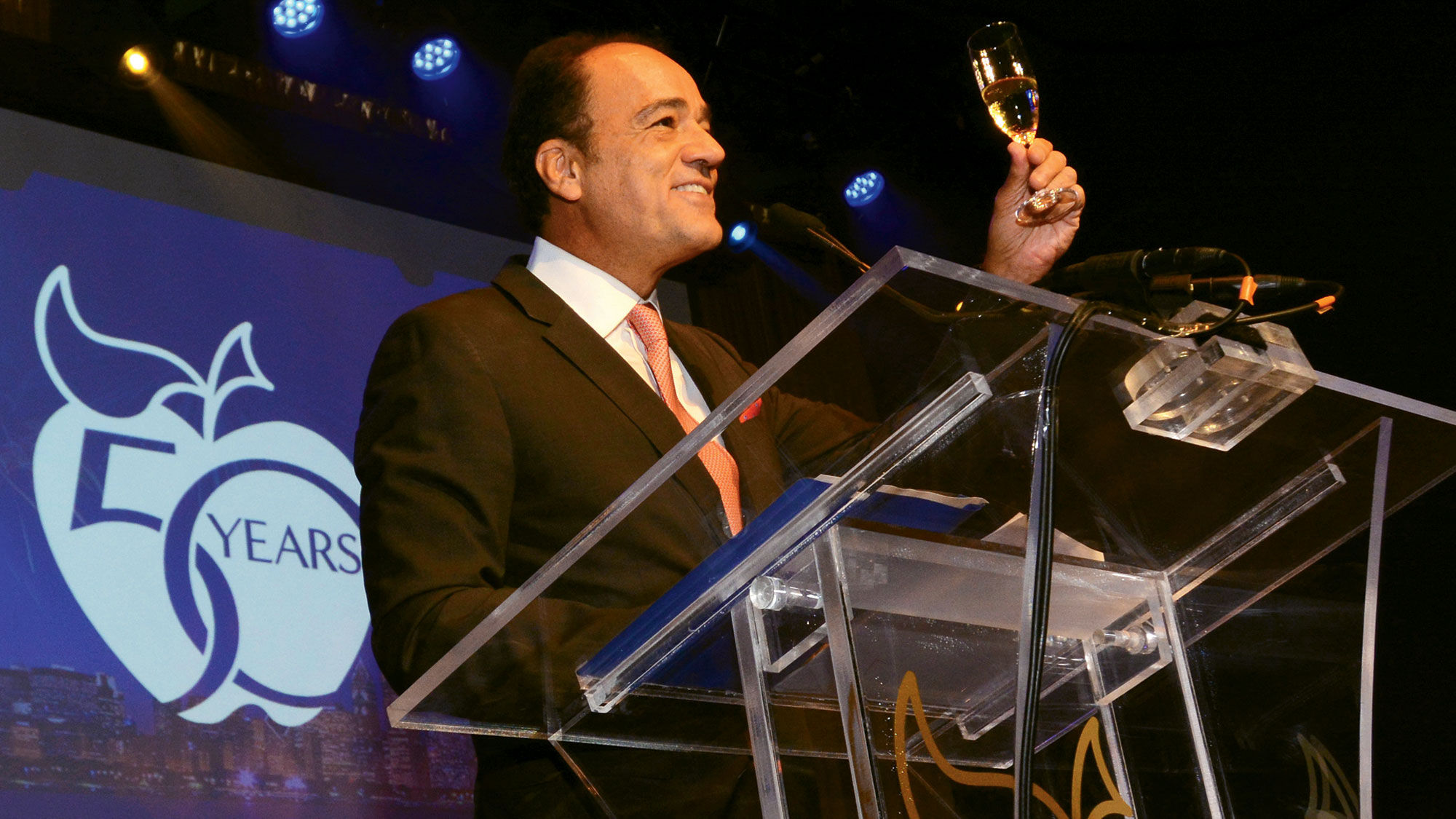 Apple Leisure Group chairman Alex Zozaya raises a glass at the company's annual awards gala in Chicago.