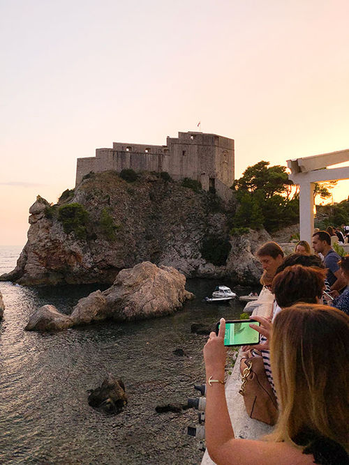 Tourists crowd around to snap a photo of Fort Lovrijenac, a filming location featured frequently on "Game of Thrones." Tourists crowd around to snap a photo of Fort Lovrijenac, a filming location featured frequently on "Game of Thrones."