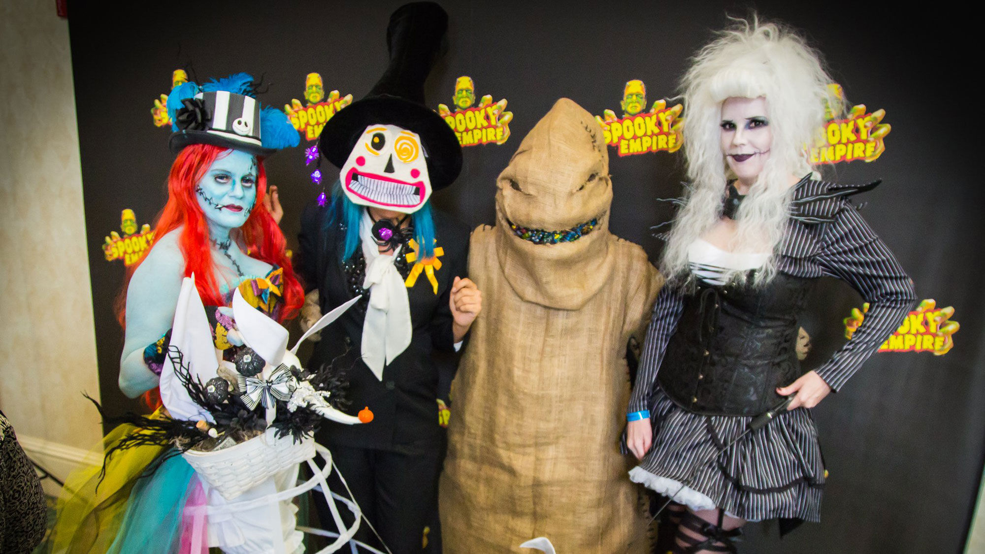 A group of fans show off their creepy outfits at Spooky Empire.