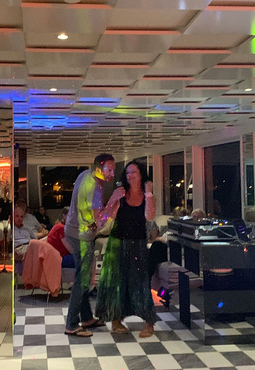 Guests on U River Cruises ship The A enjoy karaoke night on a recent sailing. Guests on U River Cruises ship The A enjoy karaoke night on a recent sailing.