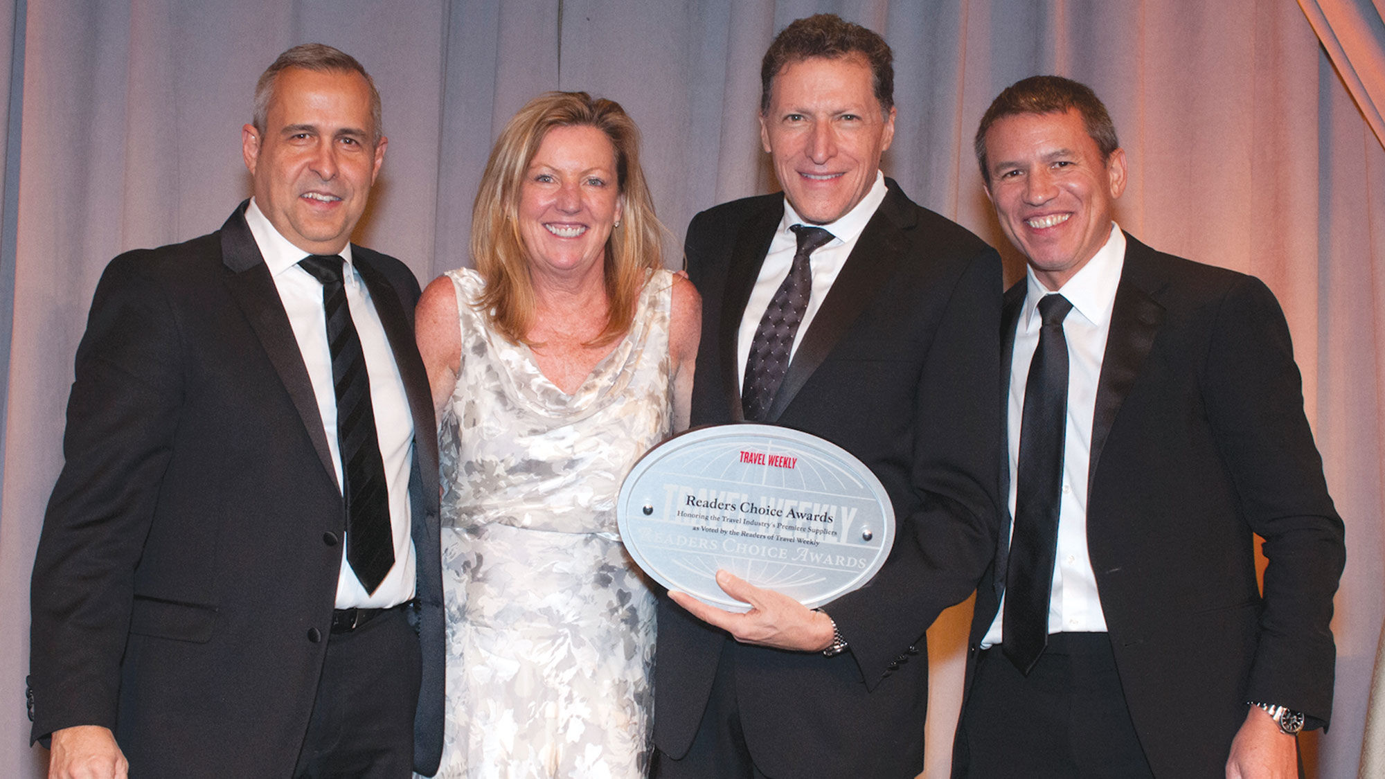 Andy Stuart, far right, at Travel Weekly's 2016 Readers Choice Awards with, from left, Alex Pinelo and Camille Olivere and Travel Weekly editor in chief Arnie Weissmann.