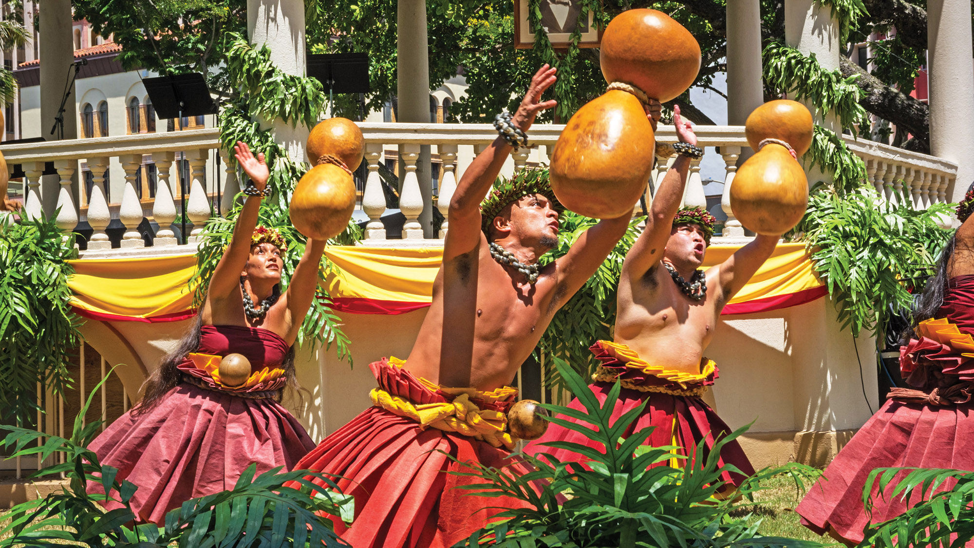 Performers at Iolani Palace, the royal residence of the rulers of the Kingdom of Hawaii in Honolulu.