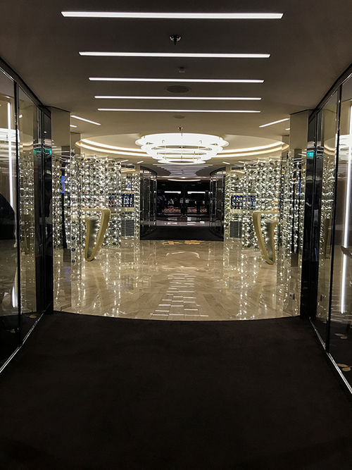 The clear vault filled with wine bottles that is the centerpiece of the main dining zone on the MSC Meraviglia. The clear vault filled with wine bottles that is the centerpiece of the main dining zone on the MSC Meraviglia.