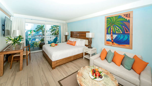 The resort’s guestrooms feature splashes of vibrant Caribbean colors.