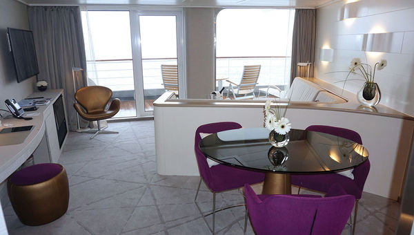 The dining nook, living room and balcony in a Grand Suite. The dining nook, living room and balcony in a Grand Suite.