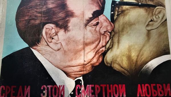 "God help me to overcome this deadly love." Former Soviet premier Leonid Brezhnev and former East German chancellor Erich Honecker, painted on what remains of the Berlin Wall. "God help me to overcome this deadly love." Former Soviet premier Leonid Brezhnev and former East German chancellor Erich Honecker, painted on what remains of the Berlin Wall.