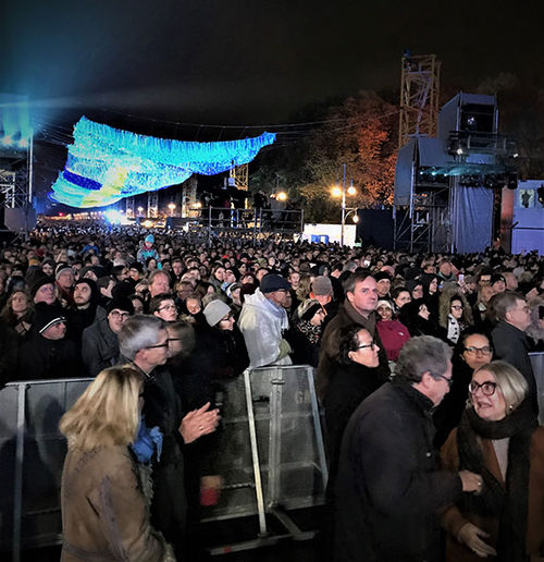 Berliners packed the area around the Brandenburg Gate to celebrate the 30th anniversary of the fall of the Berlin Wall. Berliners packed the area around the Brandenburg Gate to celebrate the 30th anniversary of the fall of the Berlin Wall.