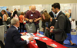 Travel advisors shop for their businesses at the Exhibitor Showcase, with suppliers representing transportation, destinations, cruise, professional services, tour operators and hotels.