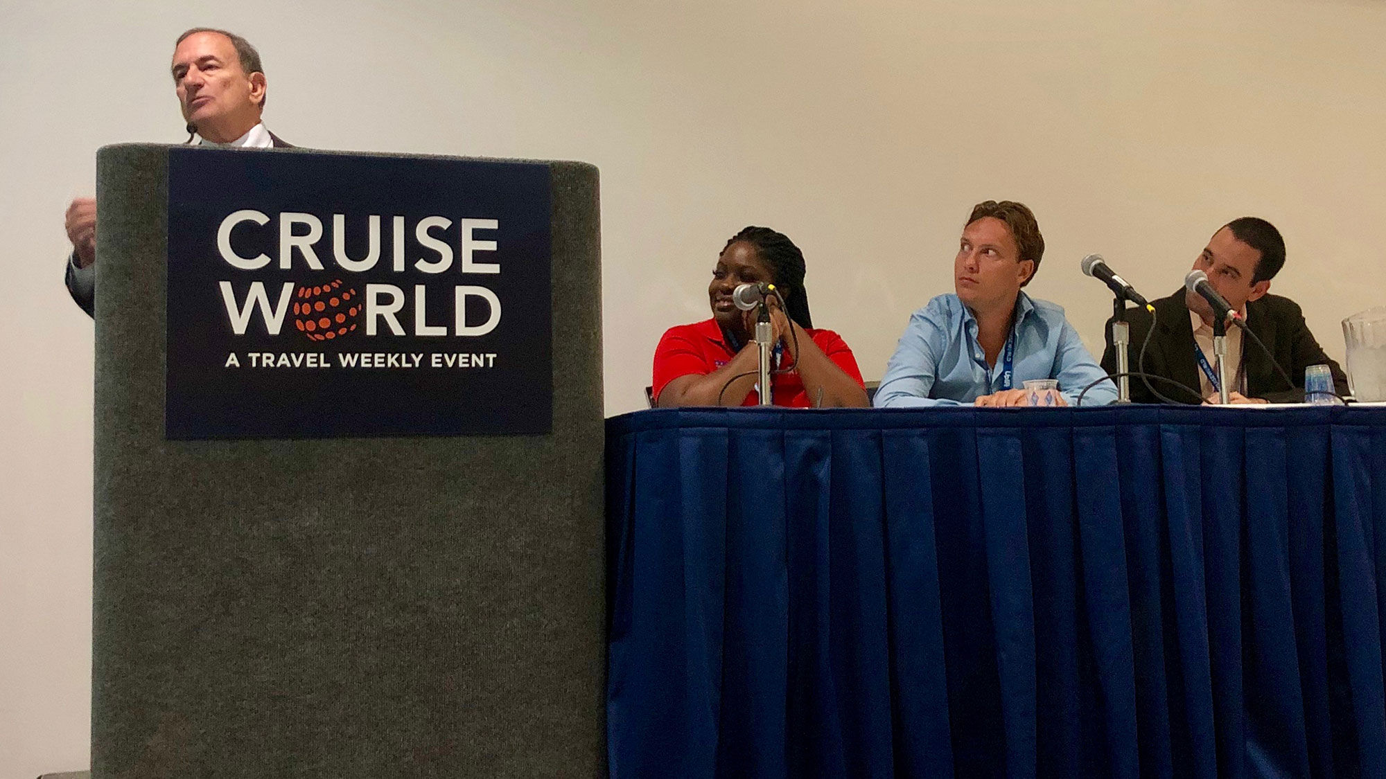 New York City Vacation Packages' Joel Cohen presents during the culinary and cultural experiences Travel Experience Immersions panel at CruiseWorld. Seated are, from left, panelists Tia Broomes of Barbados Tourism Marketing, Floris van Hoogenhuyze of Cultural Cruises Europe and Eyal Carlin of the Israel Ministry of Tourism.