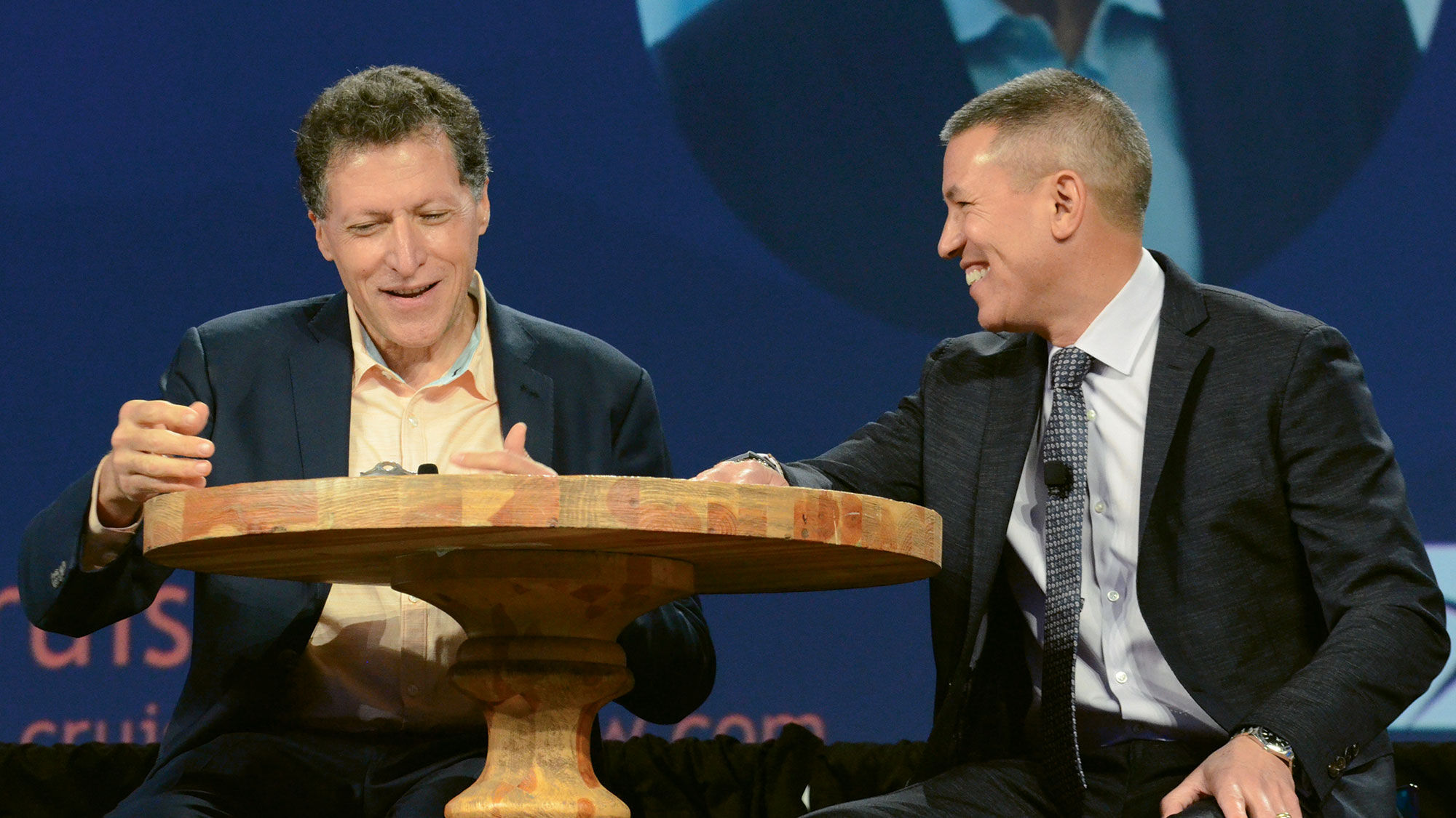 Travel Weekly editor in chief Arnie Weissmann (left) with Norwegian Cruise Line CEO Andy Stuart at CruiseWorld.