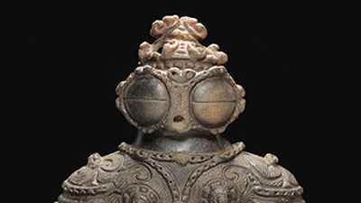 On display at the Bellagio Gallery of Fine Art is a goggle-eyed dogu from the final Jomon period.