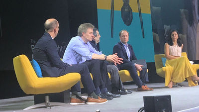 The Street Talk panel at the Phocuswright Conference. From left, Jake Fuller, Guggenheim Partners; Mark Mahaney, RBC Capital Markets; Eric Sheridan, UBS; Lloyd Walmsley, Deutsche Bank Securities; and moderator Seema Mody of CNBC.