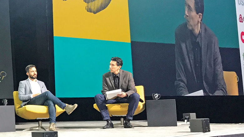 Guesty CEO Amiad Soto, left, said that the need to verify their rental will prompt many owners to turn to property managers. At right is session moderator Michael Coletta of Phocuswright.