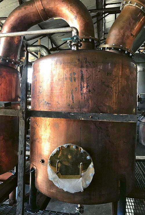 Copper stills are the heart of the Hampden Estate distillery near Falmouth, Jamaica. Copper stills are the heart of the Hampden Estate distillery near Falmouth, Jamaica.