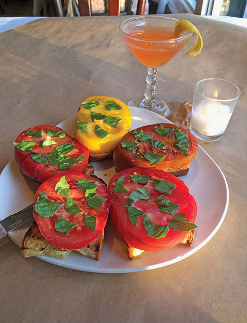 Heirloom tomato bruschetta served at the Pink Door restaurant. Heirloom tomato bruschetta served at the Pink Door restaurant.