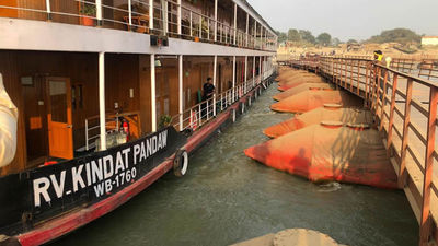 The Kindat Pandaw and the pontoon bridge it struck.
