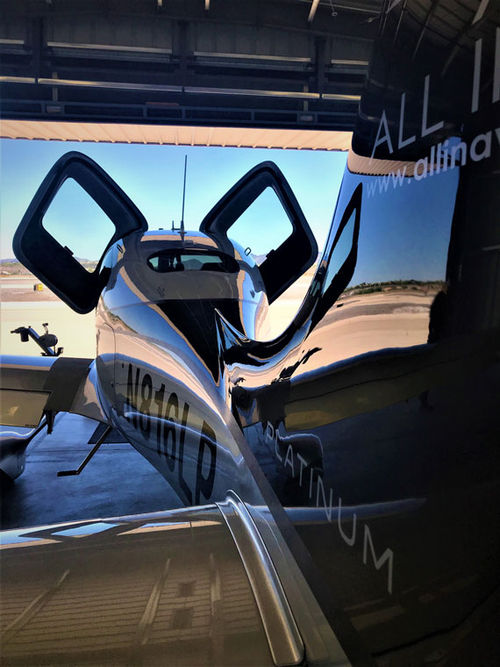 The doors of the Cirrus SR22, photographed from behind, are reminiscent of the “Back to the Future” DeLorean time machine. The doors of the Cirrus SR22, photographed from behind, are reminiscent of the “Back to the Future” DeLorean time machine.