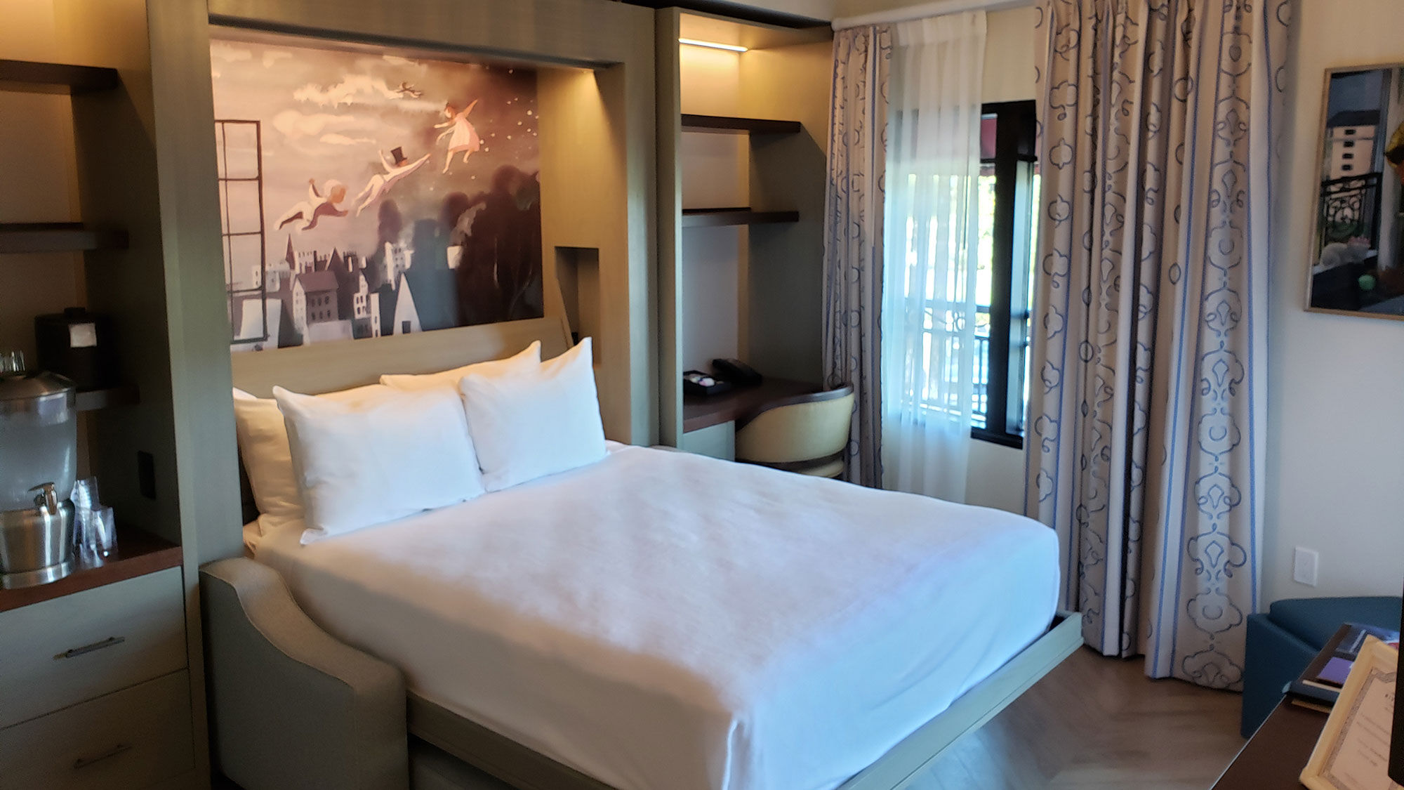 The combination bedroom and living space in the Tower Suite room category at the new Riviera Resort at Walt Disney World Resort.