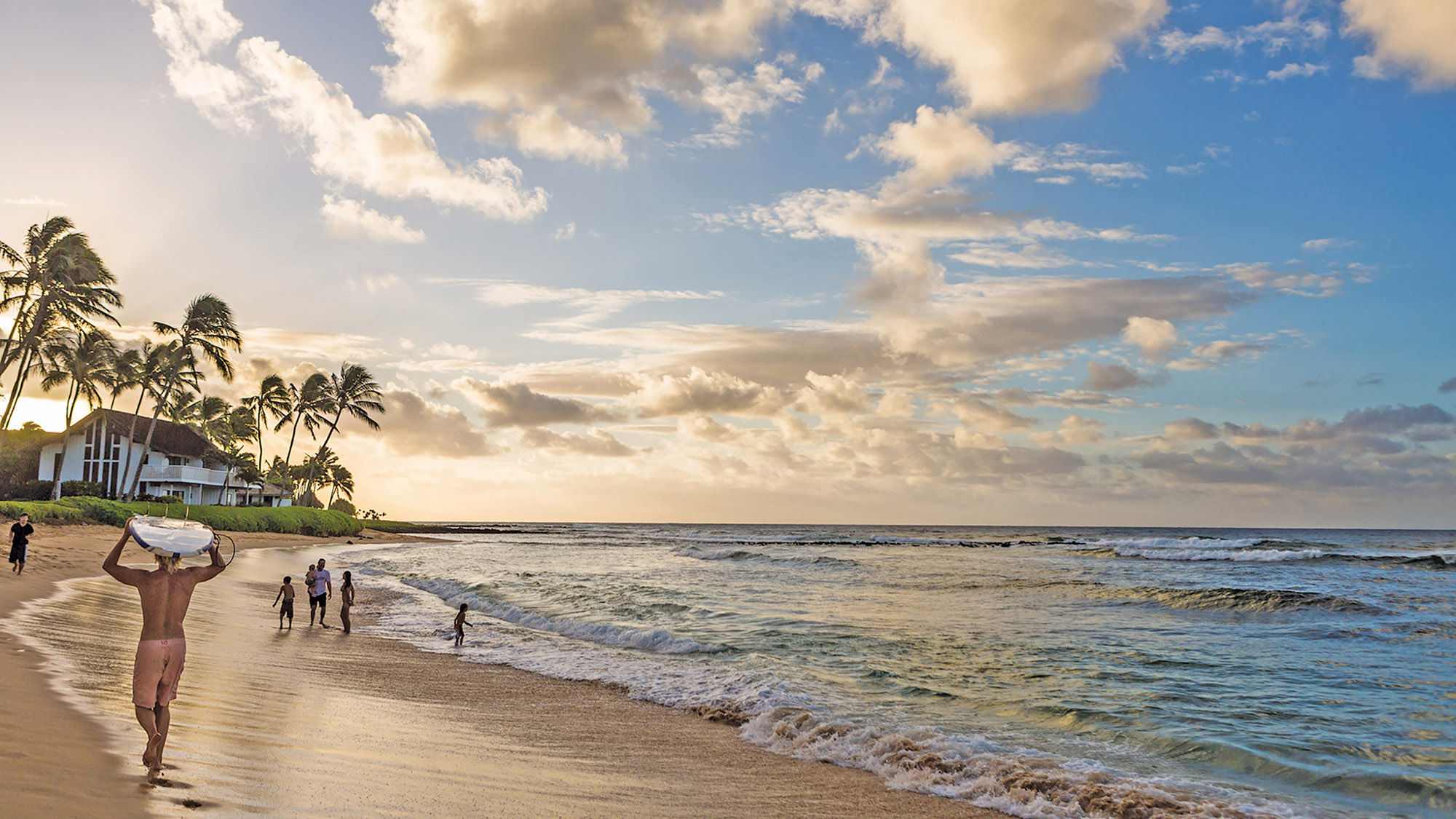 The beach at Poipu, on Kauai's south shore. The island has instituted a mandatory 14-day quarantine for all arrivals.