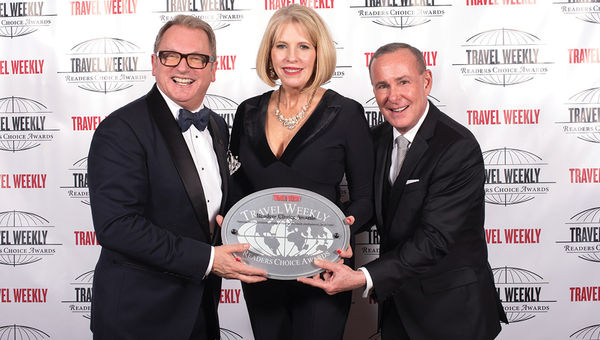 Chris Austin, Beth Widhson and Doug Seagle of Seabourn, winner in the 500 to 1,000 Berths category.
