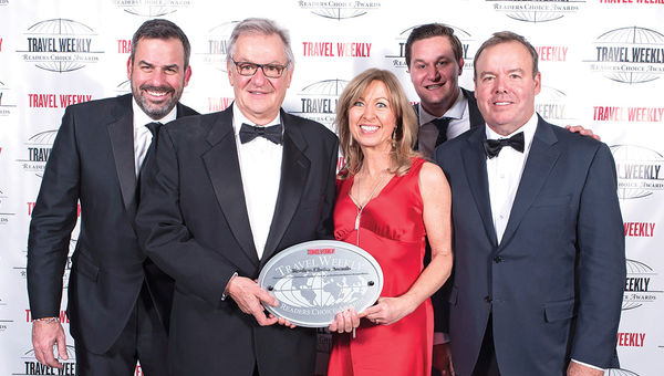 Colin Farmer of Certares with Rudi Schreiner, Kristin Karst, Jake Schreiner and Gary Murphy of AmaWaterways, whose AmaMagna won as the top river cruise ship.