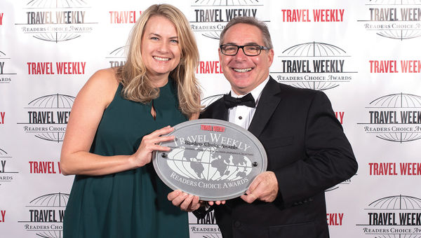 Ashley MacLaughlin and Richard Aquino of Allianz Global Assistance, which racked up its fourth consecutive victory in the Insurance Provider category.