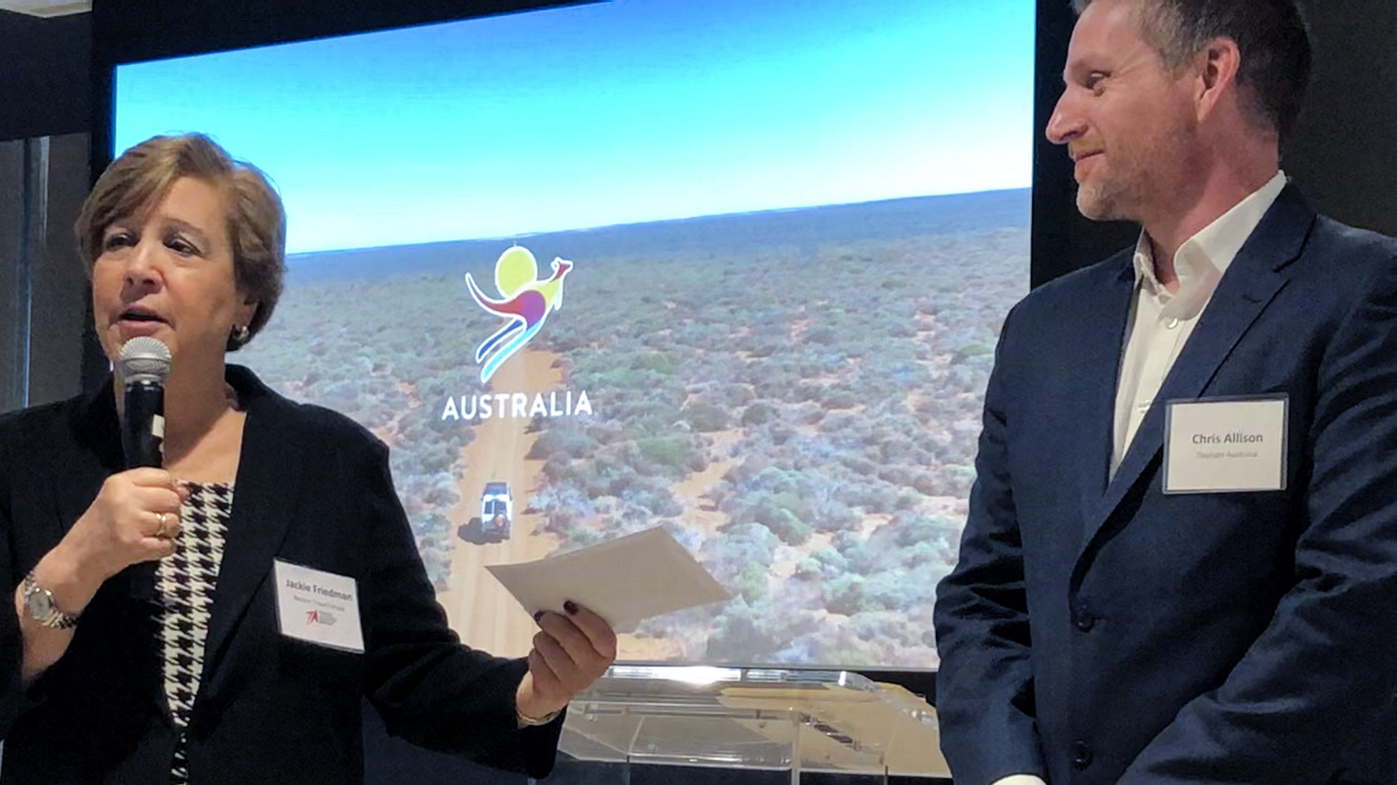Nexion president Jackie Friedman presents a check for the Australian Red Cross to Chris Allison, Tourism Australia’s head of commercial partnerships for North America, to assist in bushfire relief efforts.