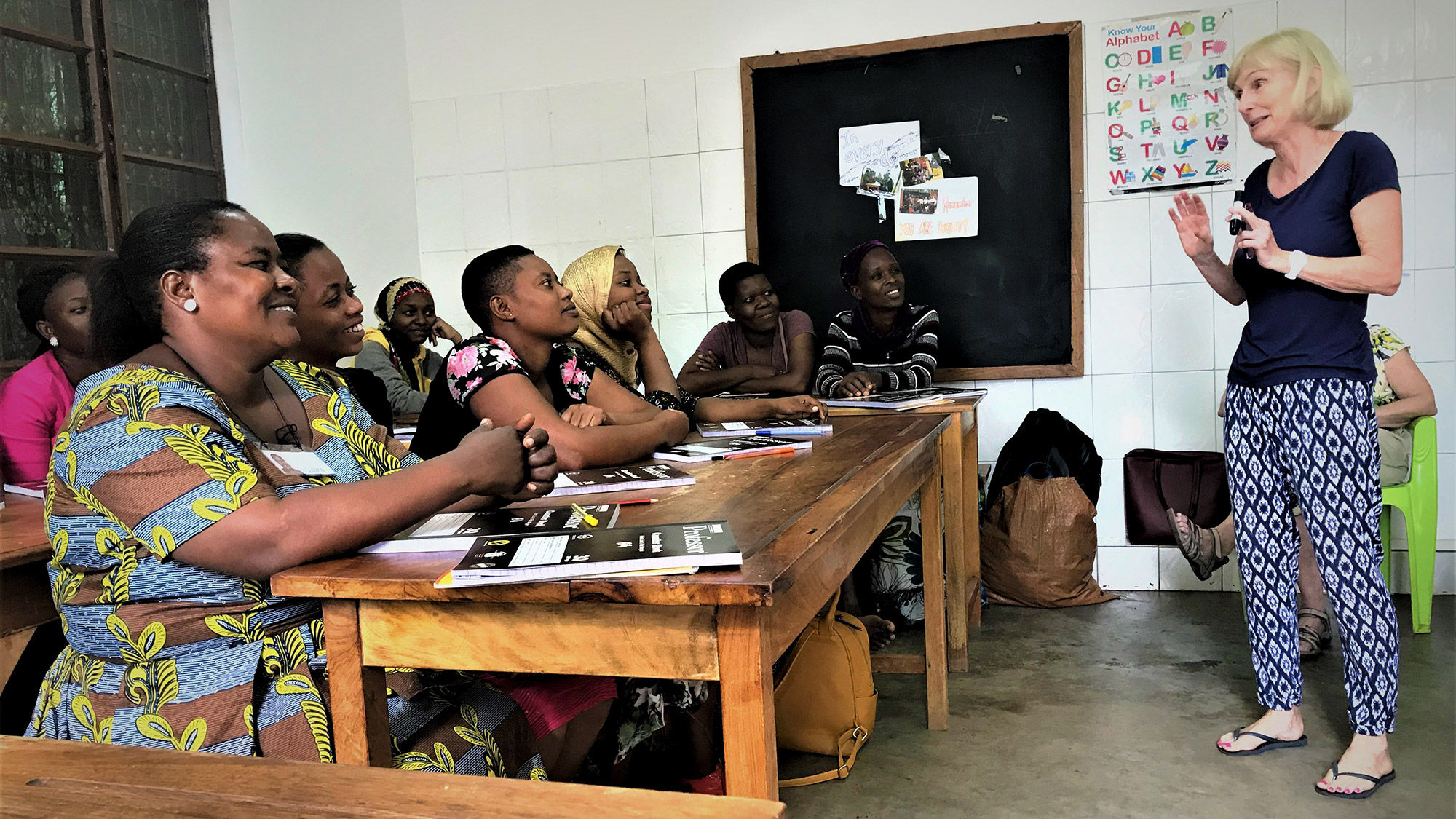 Jenny Fewtrell teaching English in a Give a Heart to Africa schoolroom.