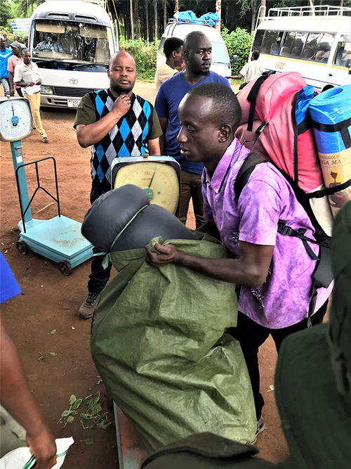 Before being allowed to ascend, porters on Kilimanjaro climbs must have their loads weighed to make sure they’re not being asked to carry more than 44 pounds. Before being allowed to ascend, porters on Kilimanjaro climbs must have their loads weighed to make sure they’re not being asked to carry more than 44 pounds.
