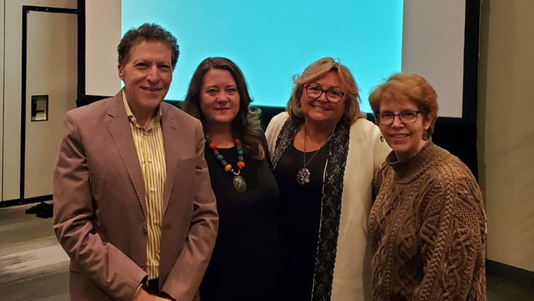 Travel Weekly editor in chief Arnie Weissmann with three travel advisors who each sold more than $1 million in travel products in 2019: Amy Vecchione, Donna Carlin and Sally Black.