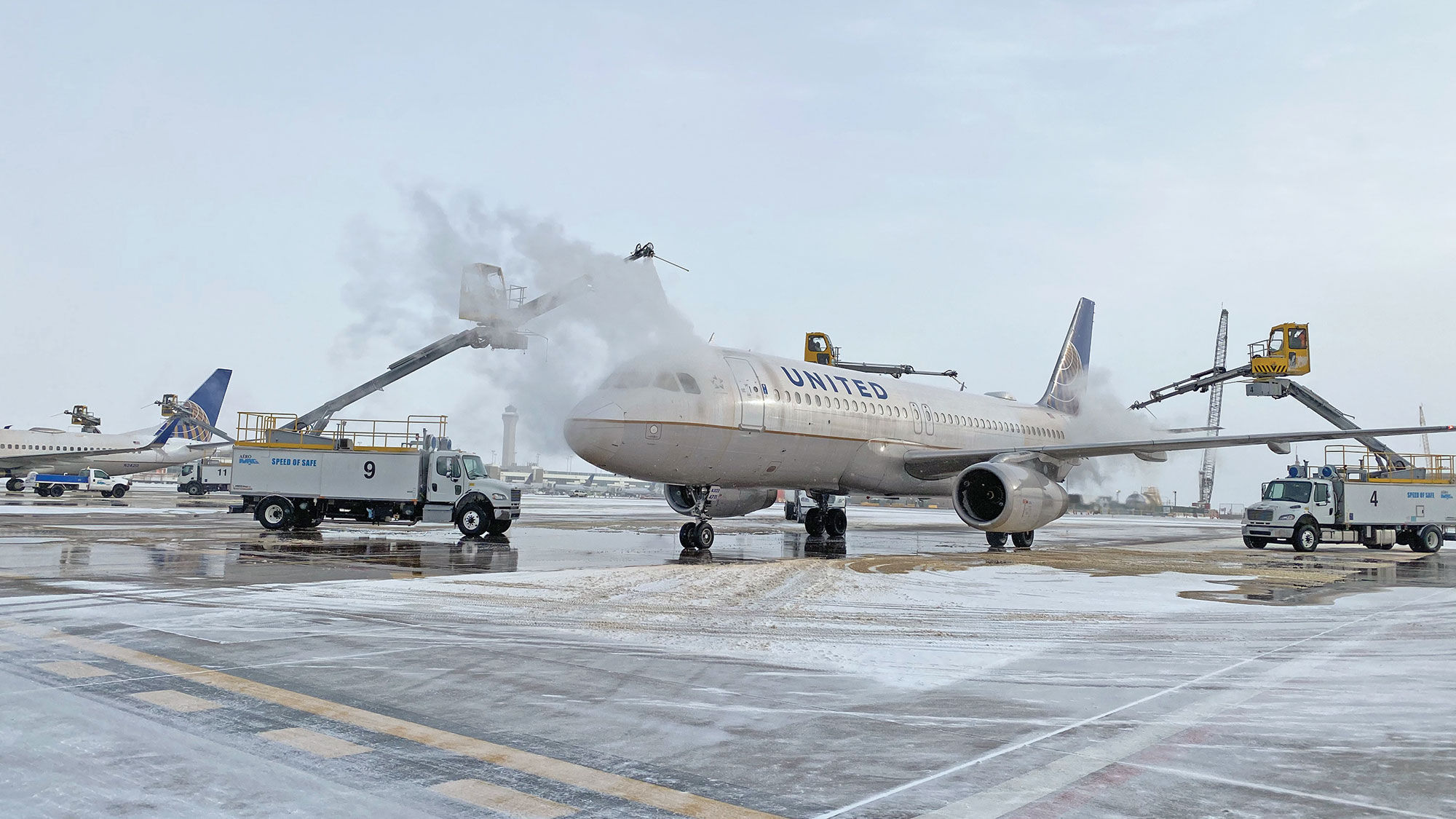 De-icing operations on a United plane at Denver Airport.