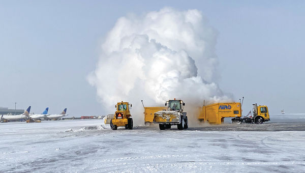 Water vapor rises from an industrial snow melter on Denver Airport’s tarmac. Water vapor rises from an industrial snow melter on Denver Airport’s tarmac.