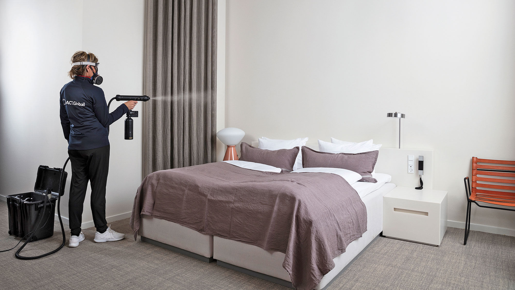 A room is treated with  Act.Global’s Act CleanCoat, a coating that is then activated with sunlight or artificial light.