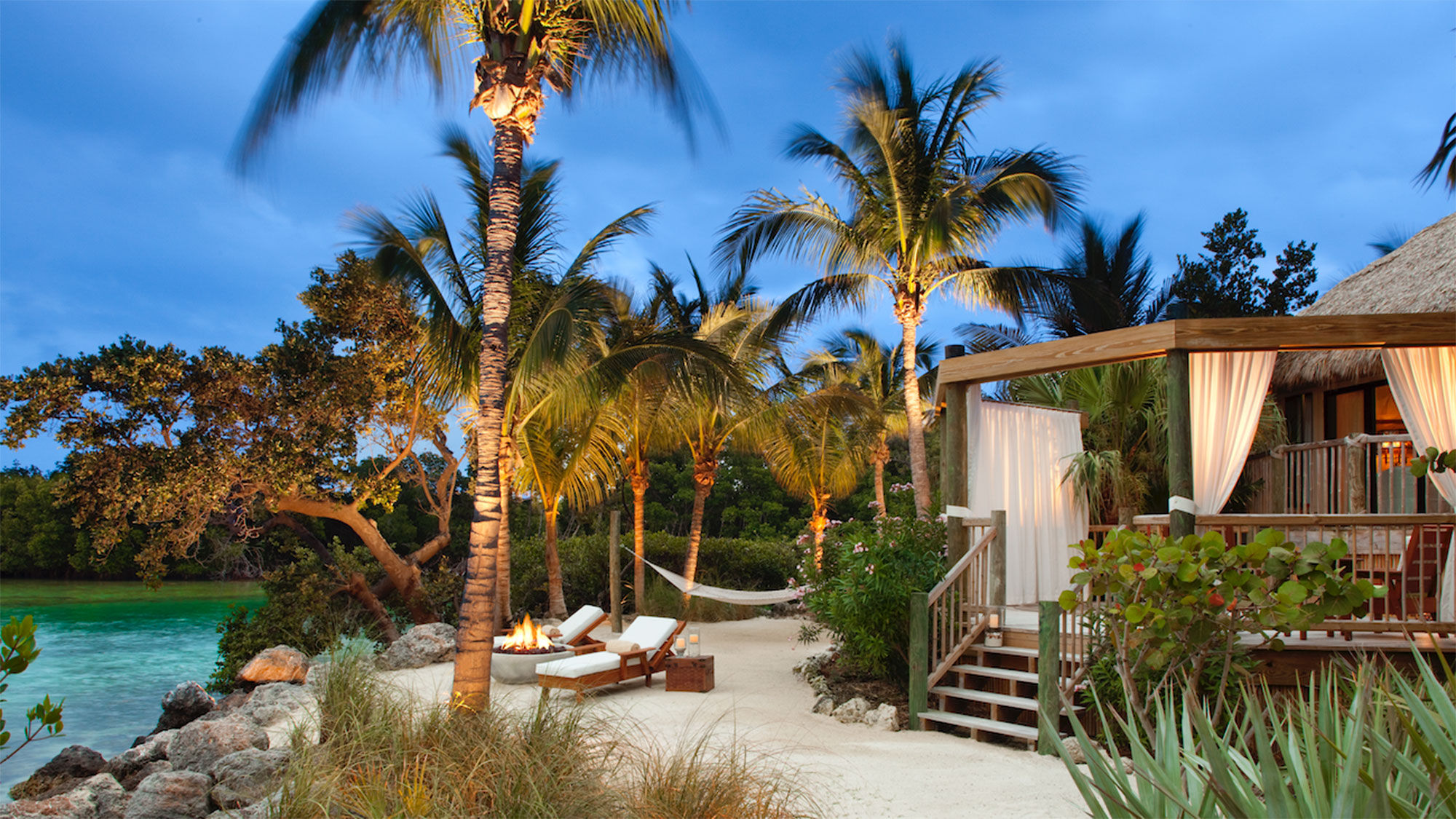 One of 30 thatch-roofed bungalows at Little Palm Island in the Florida Keys, which reopened in March two-and-a-half years after damage from Hurricane Irma shut it down.