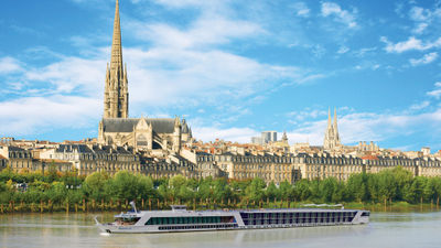 AmaWaterways' AmaDolce sailing in Bordeaux, France. The line is still helping Covid-infected guests coordinate arrangements during an onshore quarantine period but will no longer cover the cost of those arrangements.
