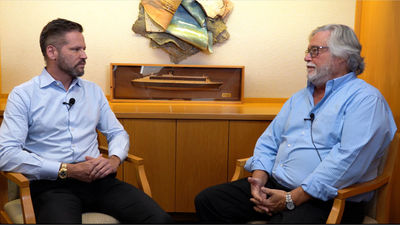 Carnival Cruise Line senior vice president of global sales and trade marketing Adolfo Perez (left) with Carnival Corp. chairman Micky Arison in a pre-recorded conversation shown during Travel Weekly's webinar.