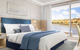 The bedroom in the Explorer Suite.