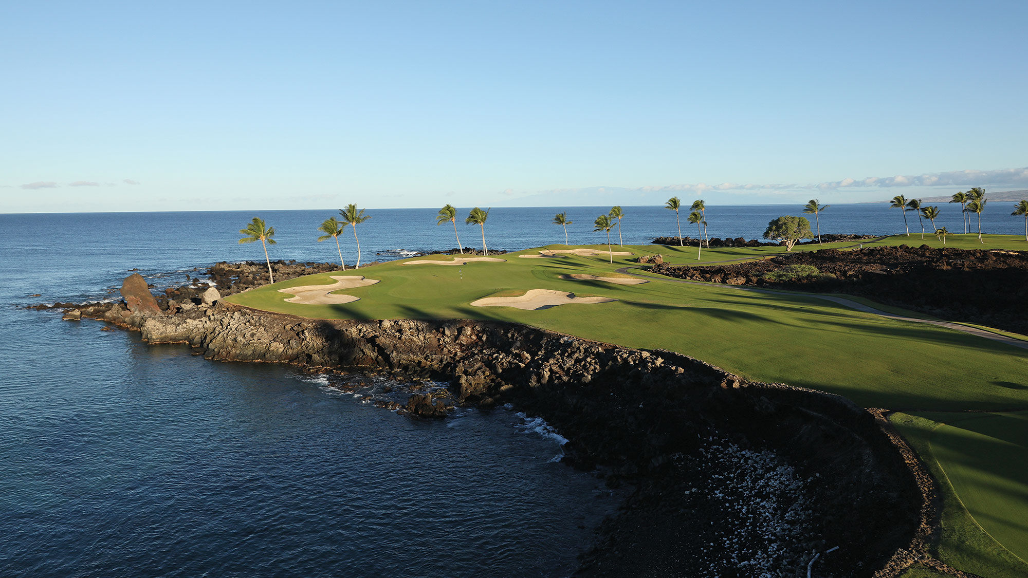 The South course at Mauna Lani on the Island of Hawaii is perched spectacularly along the ocean.