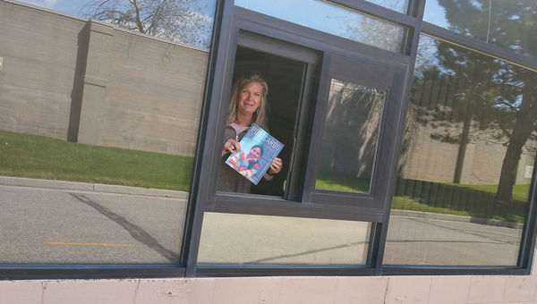 Kristy Osborn, owner of a Travel Leaders agency in Loveland, Colo., will use her office’s drive-through window to conduct business while practicing social distancing. Kristy Osborn, owner of a Travel Leaders agency in Loveland, Colo., will use her office’s drive-through window to conduct business while practicing social distancing.