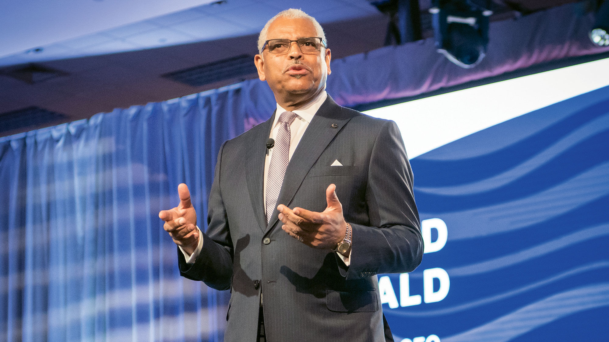 Carnival Corp. CEO Arnold Donald speaking at the CLIA Cruise3Sixty conference in 2018.